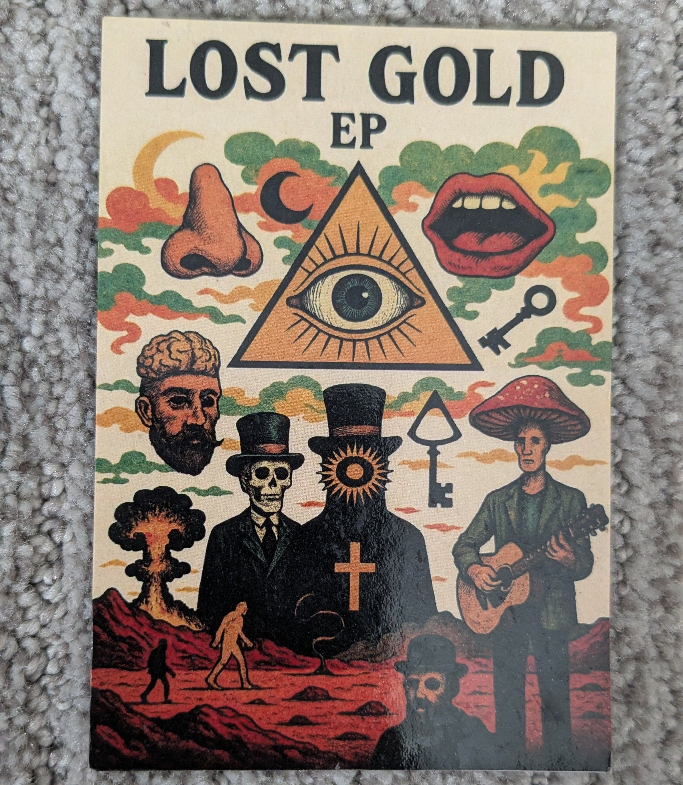 Album cover for 'Lost Gold EP' with colorful design elements on a textured surface